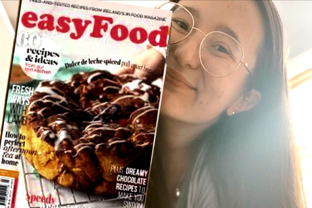Photo of person holding a magazine that reads “Easyfood”.
